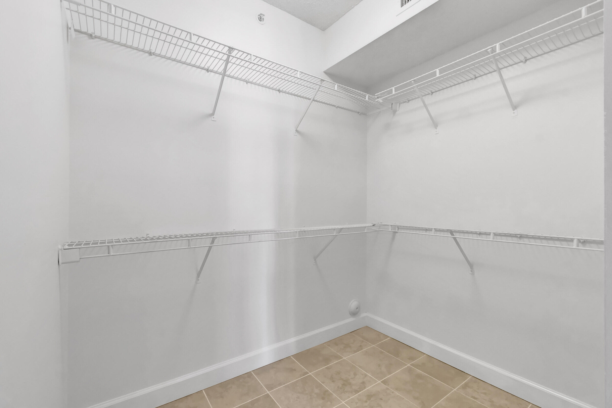 15364 Lakes Of Delray Boulevard, Unit 45 Delray Beach, FL 33484 - Photo 34 of 56 a view of a room with racks on the wall