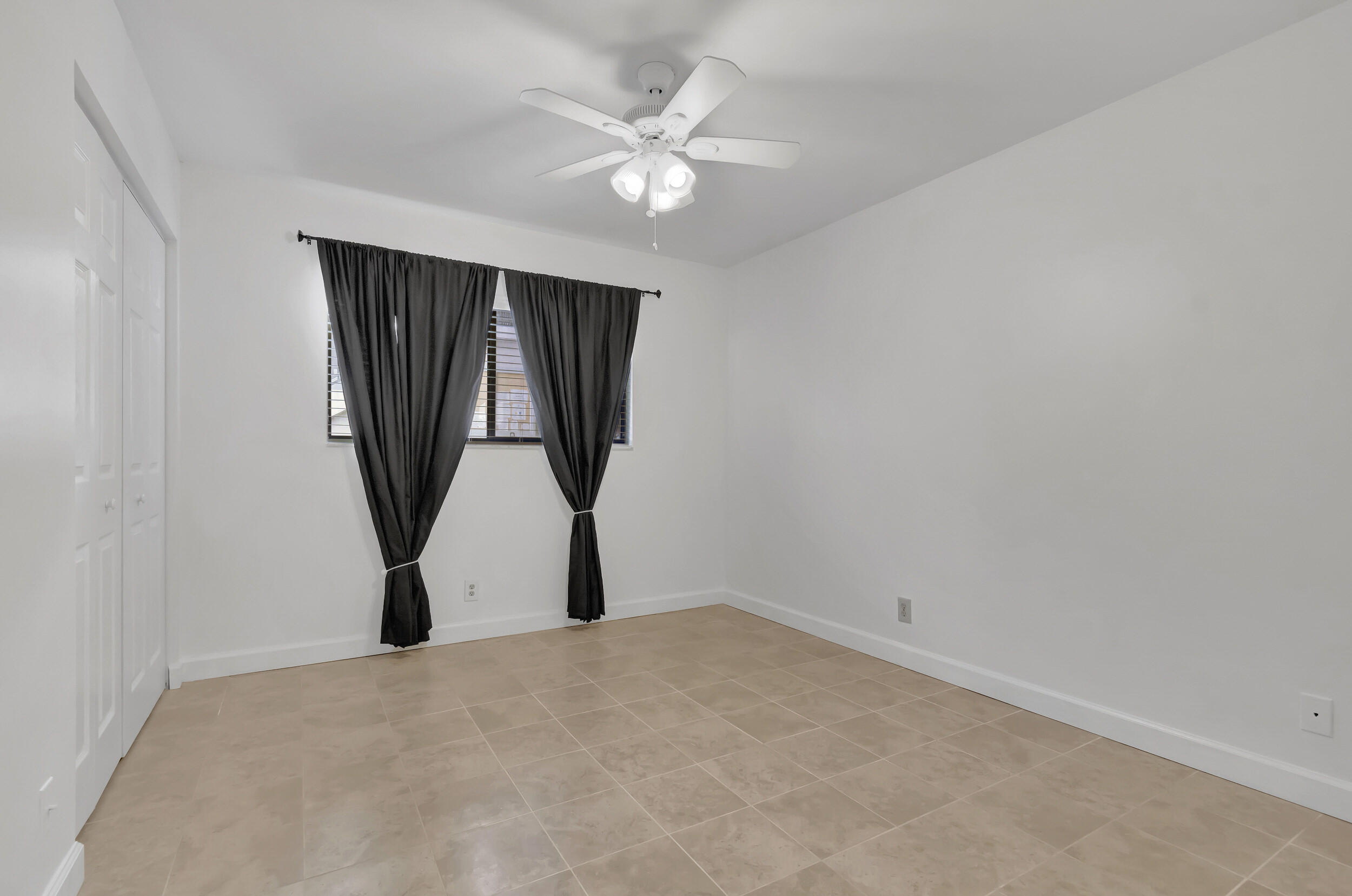 15364 Lakes Of Delray Boulevard, Unit 45 Delray Beach, FL 33484 - Photo 37 of 56 wooden floor in an empty room with a window