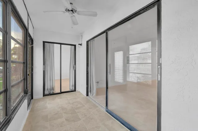 a view of a house with a yard and plants