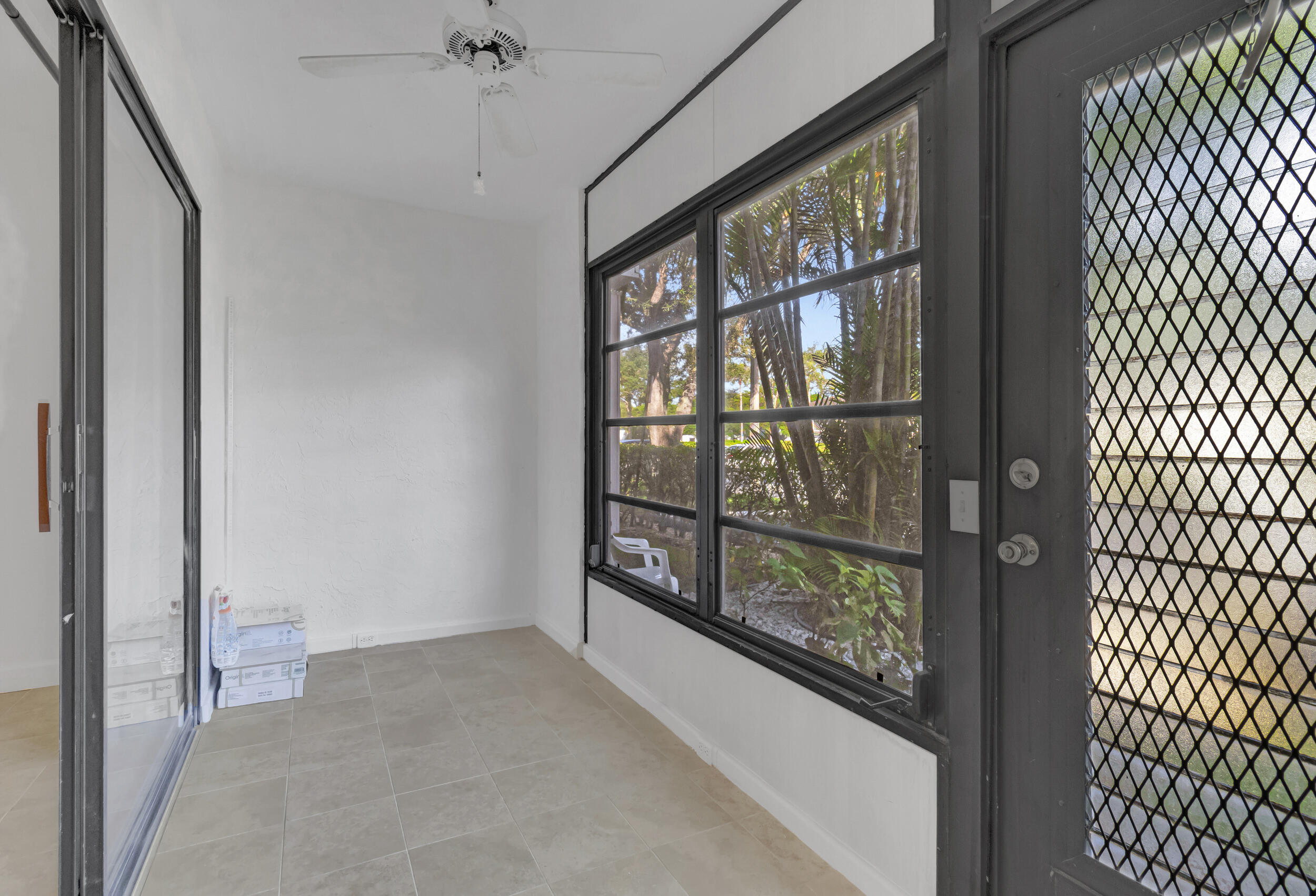 15364 Lakes Of Delray Boulevard, Unit 45 Delray Beach, FL 33484 - Photo 43 of 56 a view of front door
