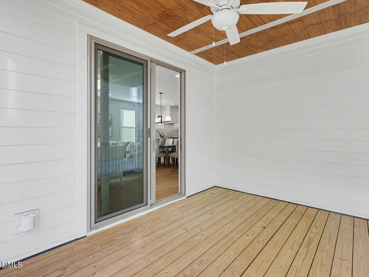 2312 Broad Street Durham, NC 27704 - Photo 24 of 53 a view of empty room with wooden floor and fan