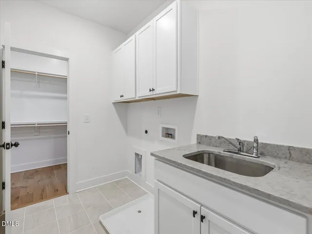 a view of a bathroom from a hallway