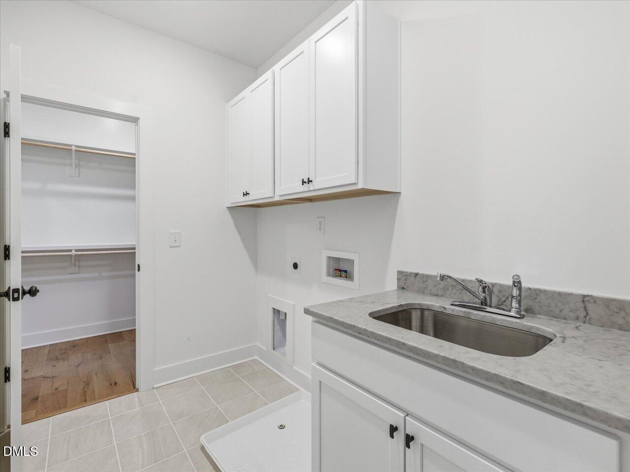 2312 Broad Street Durham, NC 27704 - Photo 38 of 53 a close view of sink and tap