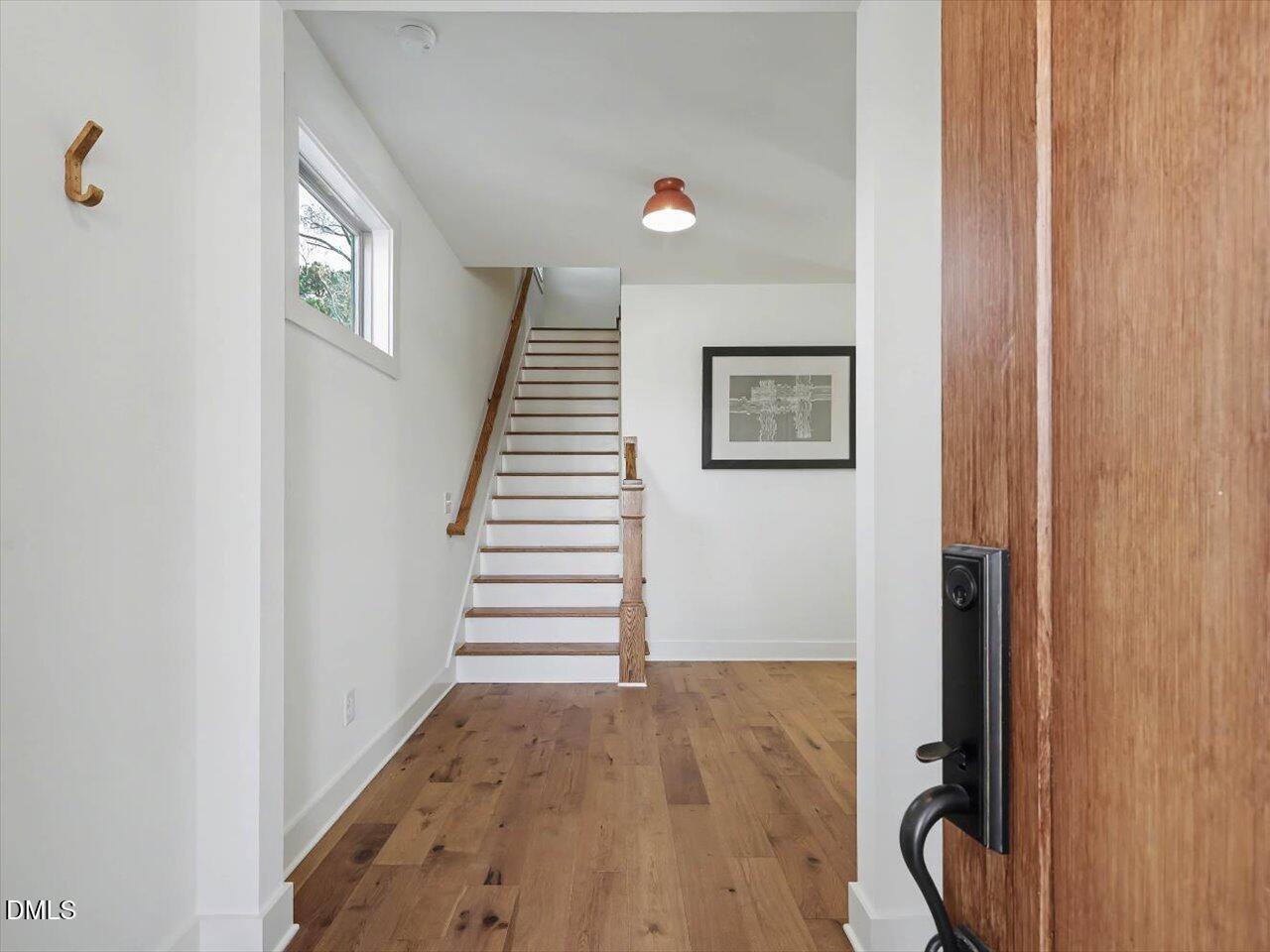 2312 Broad Street Durham, NC 27704 - Photo 4 of 53 a view of an entryway with staircase