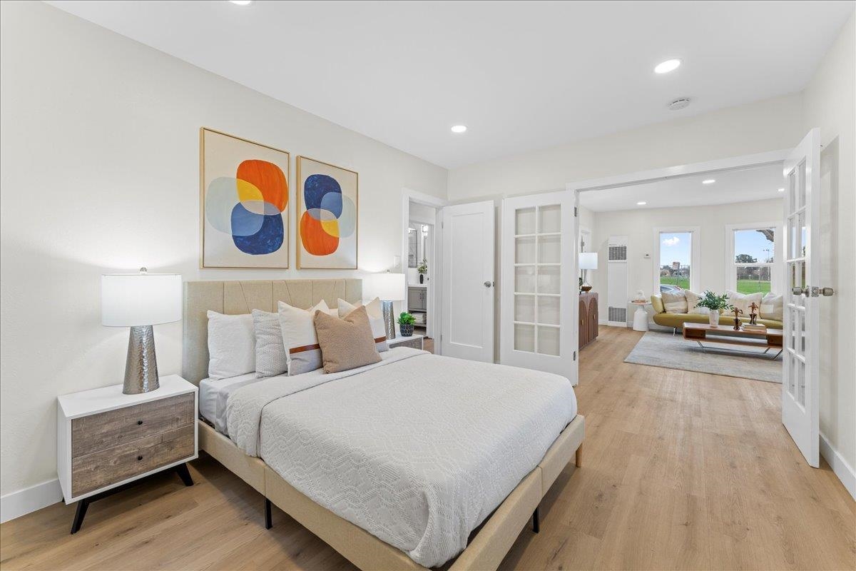 2717 Mabel Street Berkeley, CA 94702 - Photo 12 of 59 Bedroom featuring french doors, light wood finished floors, and recessed lighting