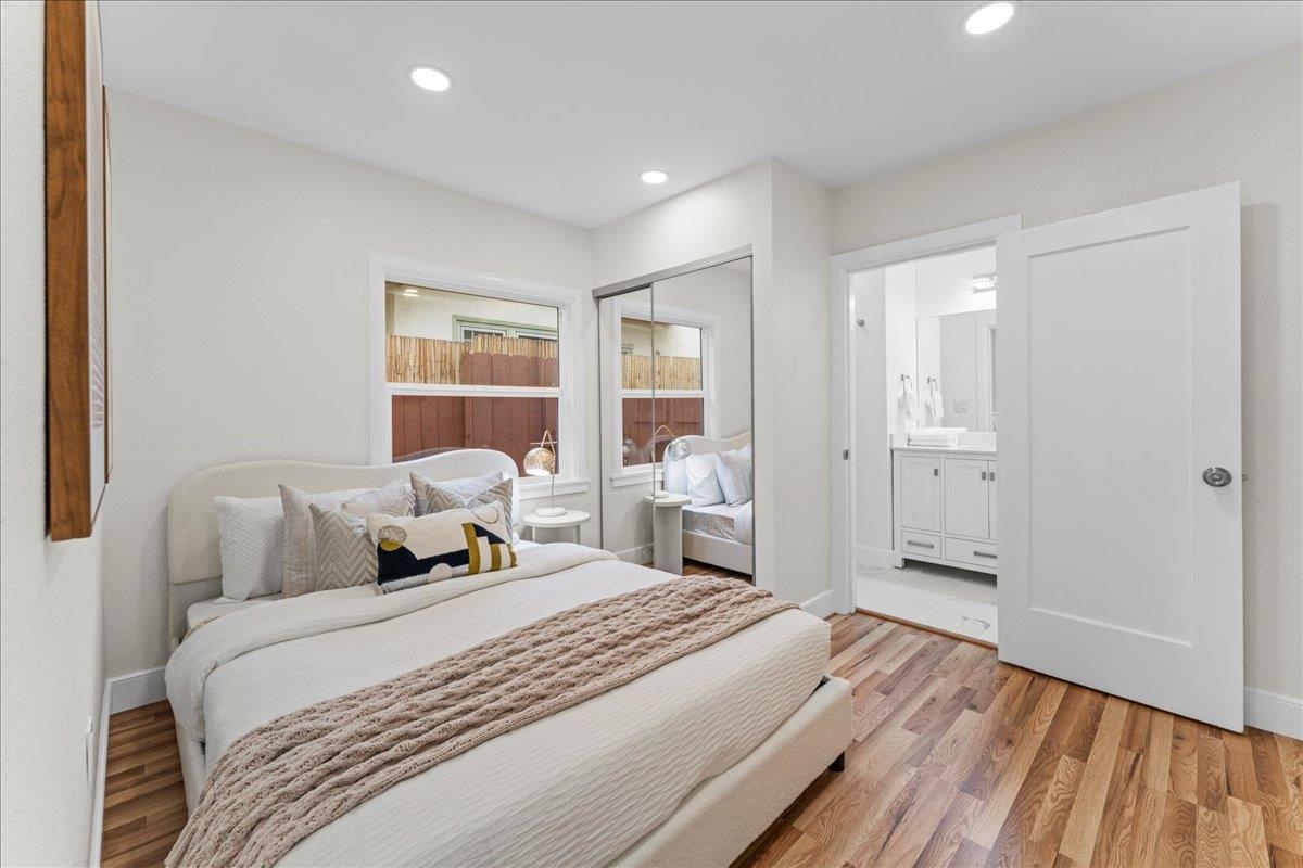 2717 Mabel Street Berkeley, CA 94702 - Photo 38 of 59 Bedroom featuring a closet, light wood-style floors, and recessed lighting