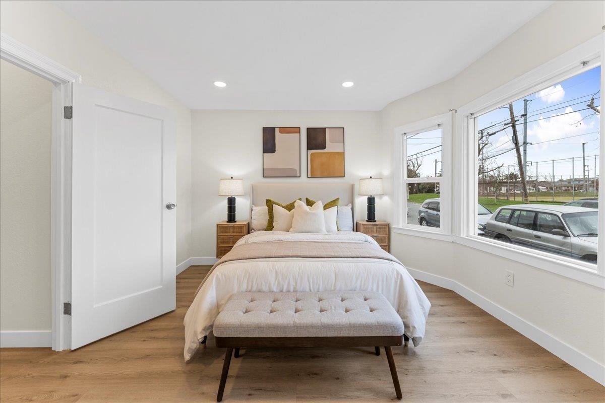 2717 Mabel Street Berkeley, CA 94702 - Photo 7 of 59 Bedroom featuring light wood finished floors and recessed lighting