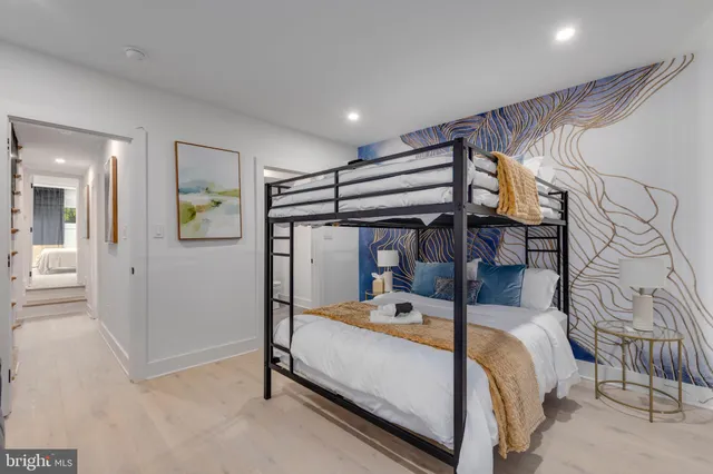 a bedroom with a bed and a walk in closet