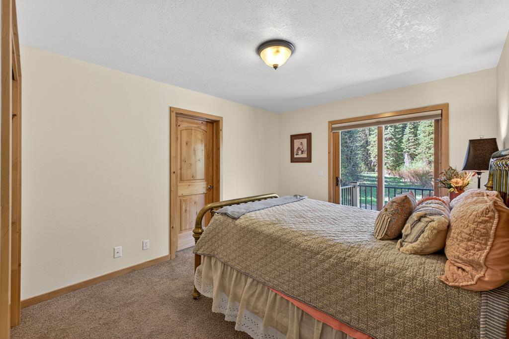 31 Eagle Trail Cascade, ID 83611 - Photo 34 of 50 The second guest room has the access to the unfinished bonus room.