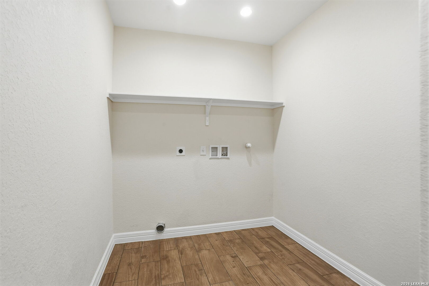 100 West Short Meadow Drive Lytle, TX 78052 - Photo 30 of 51 a view of small space with racks on the wall