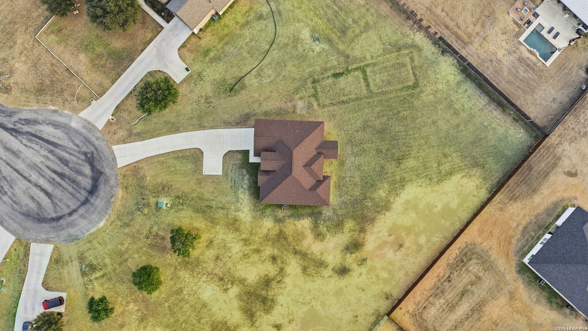 100 West Short Meadow Drive Lytle, TX 78052 - Photo 49 of 51 a bathroom with a sink