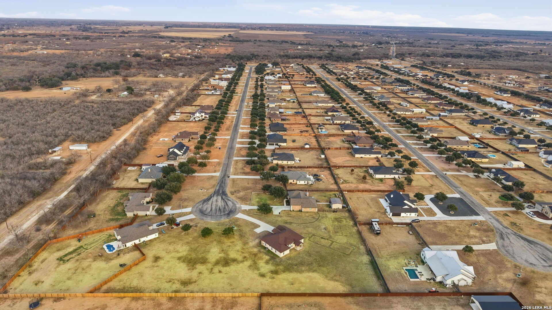 100 West Short Meadow Drive Lytle, TX 78052 - Photo 51 of 51 an aerial view of residential houses with outdoor space