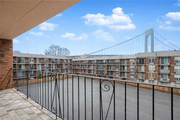 a view of a balcony with city view