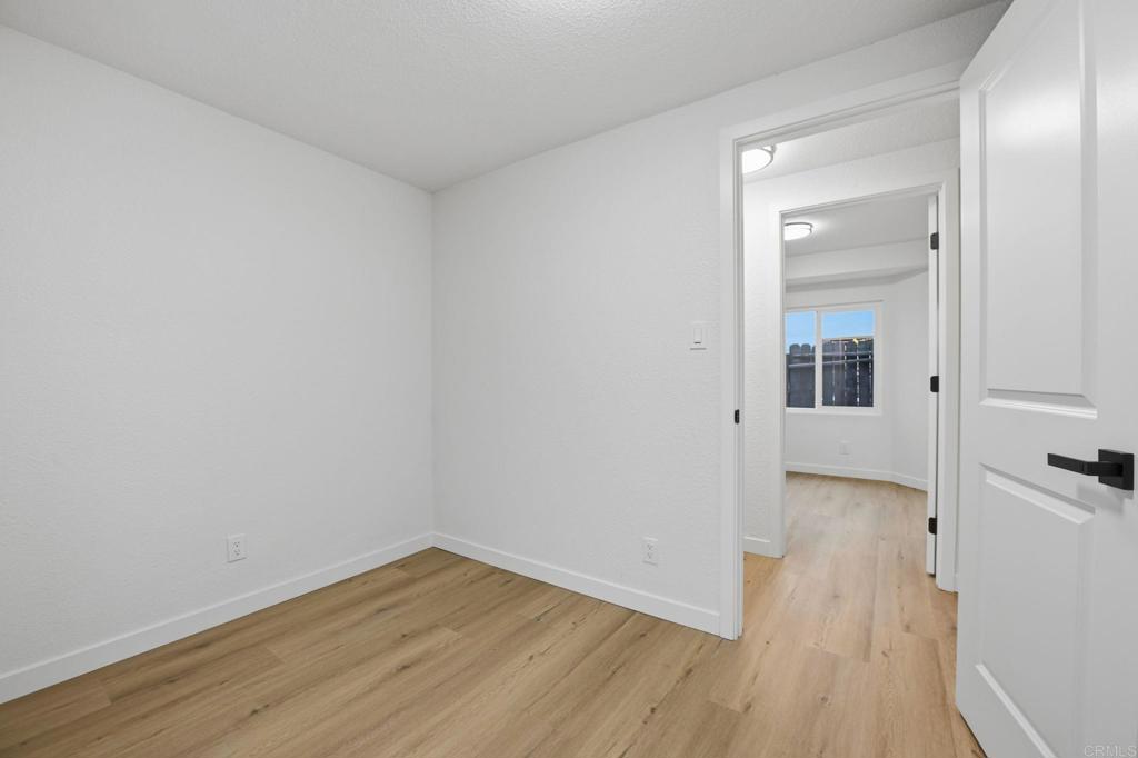 1333 Helix Street Spring Valley, CA 91977 - Photo 35 of 45 a view of a room with wooden floor