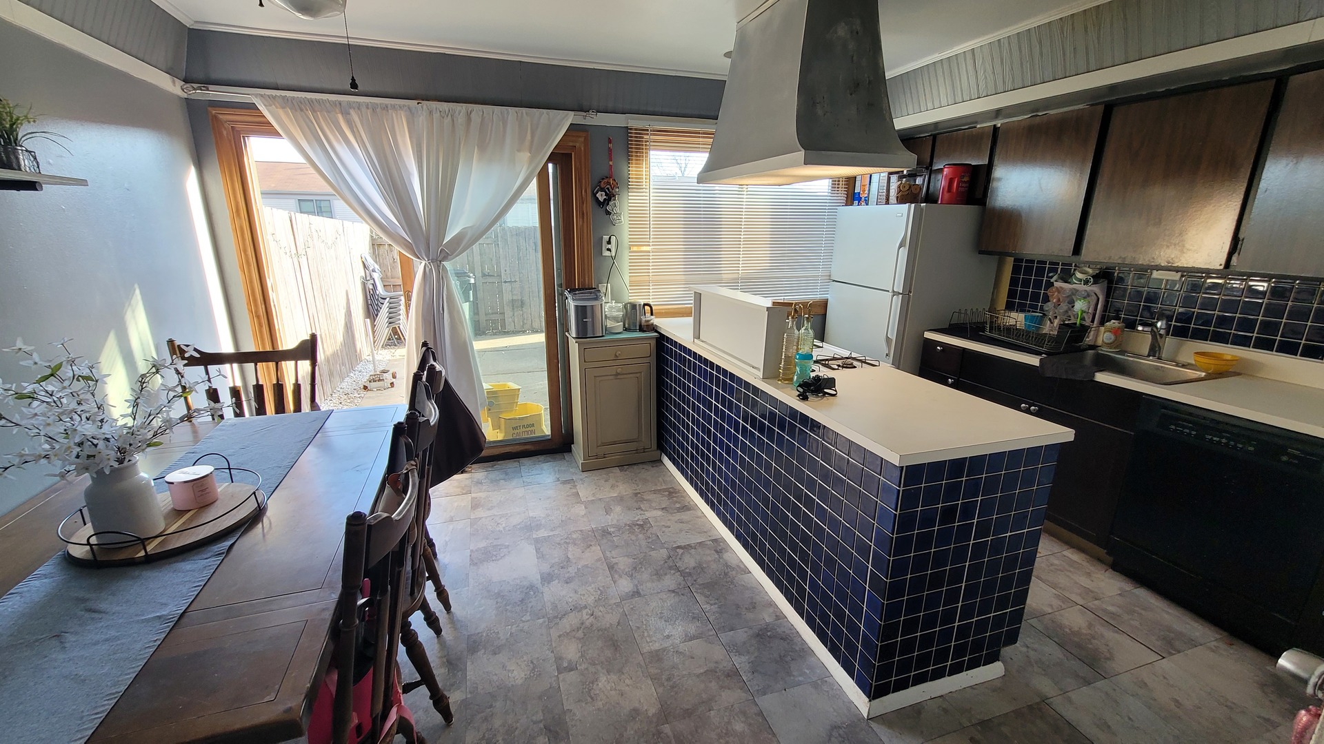 1799 Bristol Walk Hoffman Estates, IL 60169 - Photo 5 of 10 a room with table closet and wooden floor