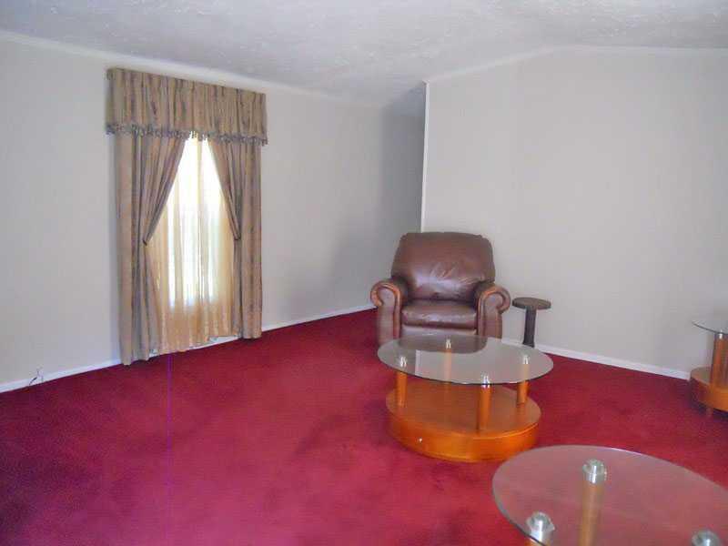 696 Tate Road Corinth, ME 04427 - Photo 11 of 35 Exterior Front. Living room. Window...