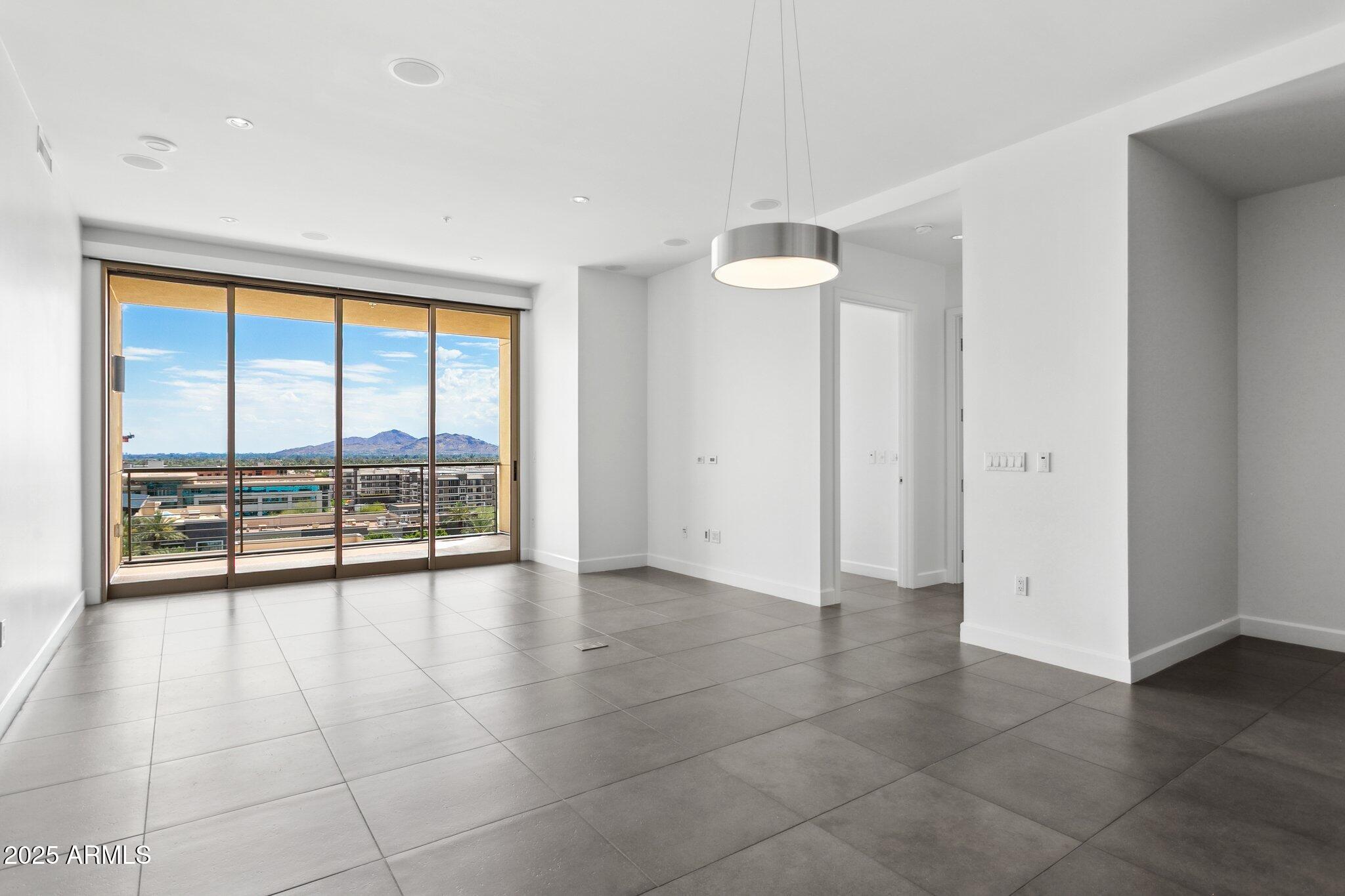 15215 North Kierland Boulevard, Unit 733 Scottsdale, AZ 85254 - Photo 5 of 38 Sliding Wall of Glass