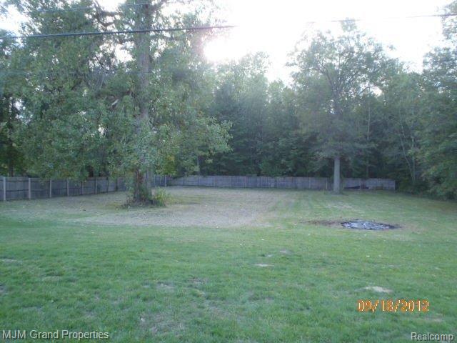 22900 Sumpter Road Belleville, MI 48111 - Photo 16 of 17 22900 Sumpter Rear Yard.jpg