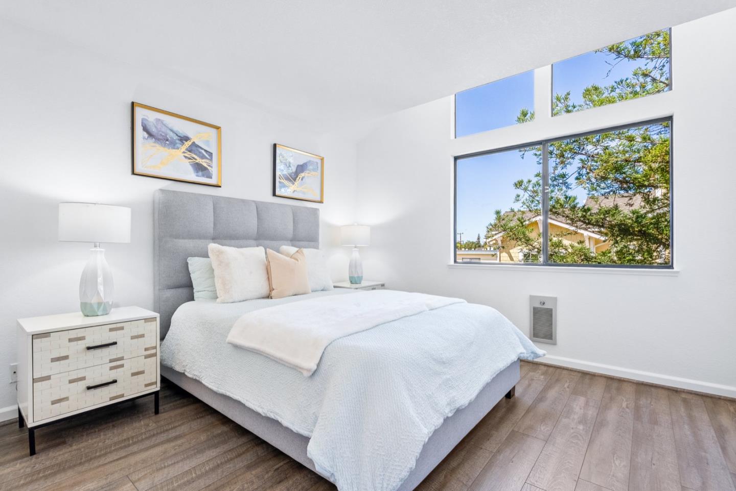 2863 South Bascom Avenue, Unit 804 Campbell, CA 95008 - Photo 14 of 28 a bedroom with a bed and a night stand