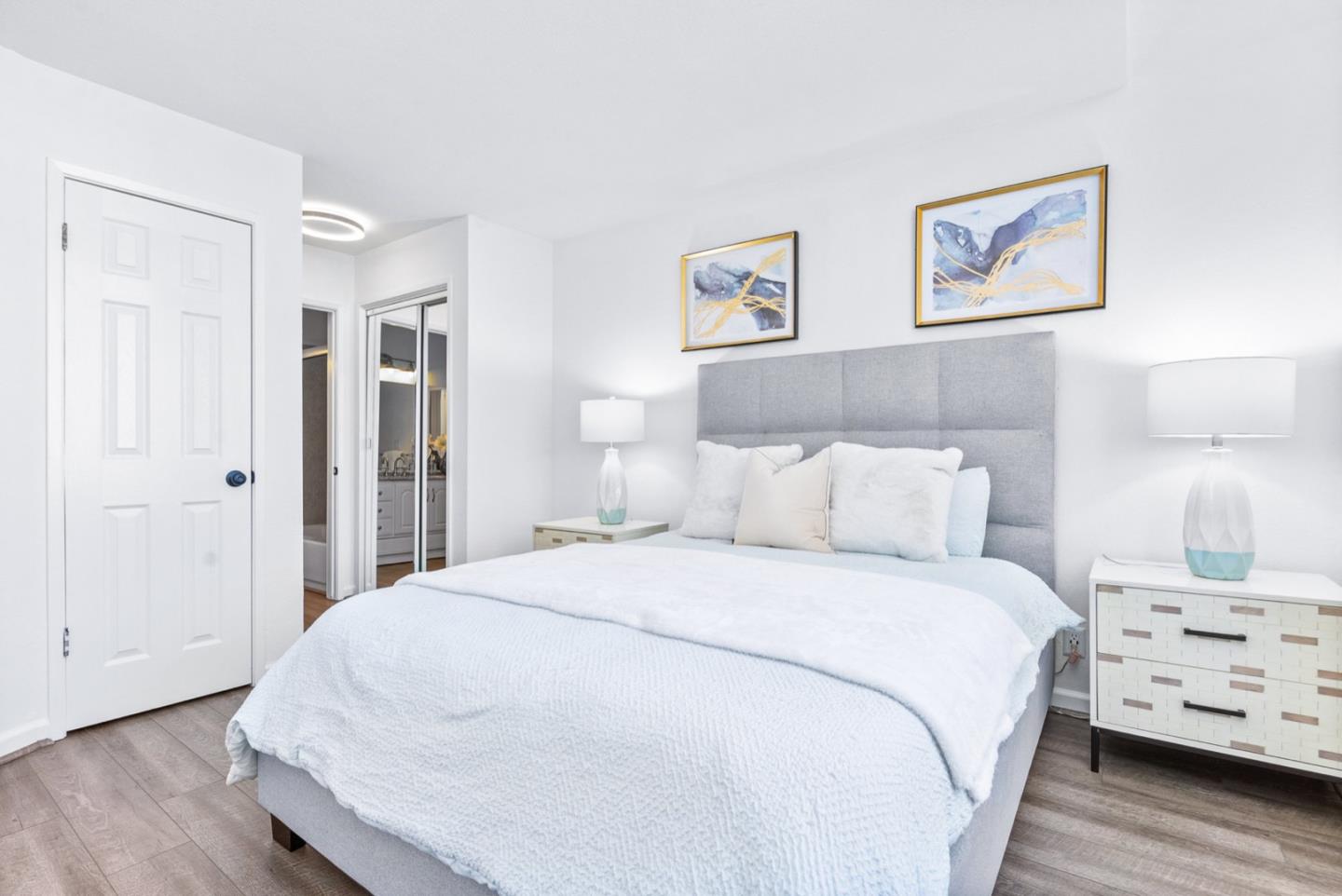 2863 South Bascom Avenue, Unit 804 Campbell, CA 95008 - Photo 15 of 28 a large white bed in a white room