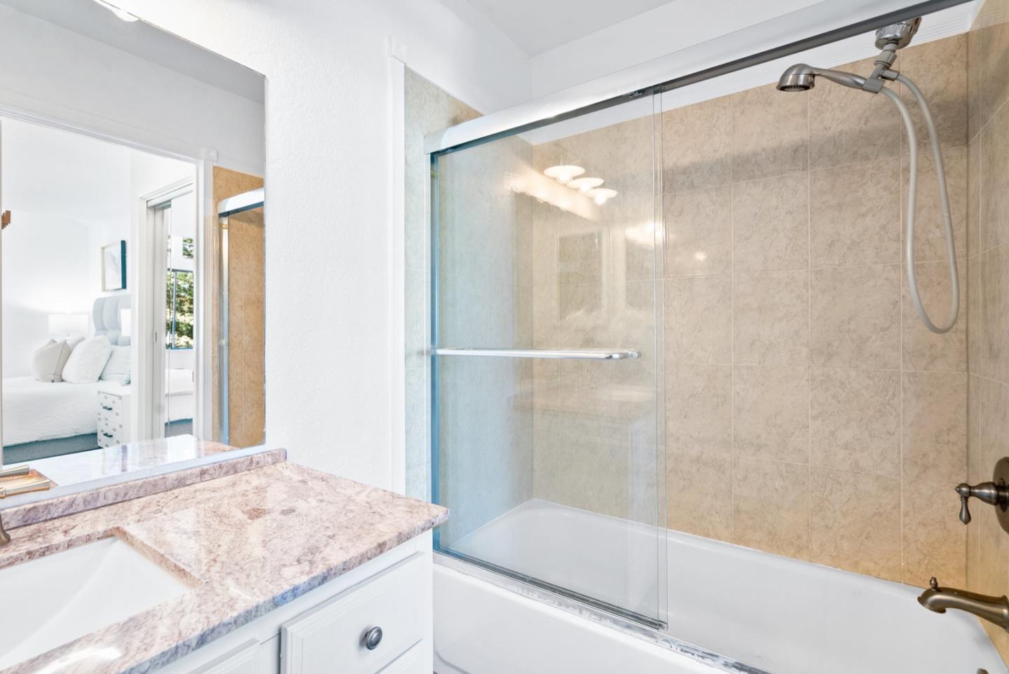 2863 South Bascom Avenue, Unit 804 Campbell, CA 95008 - Photo 19 of 28 a bathroom with a granite countertop sink toilet and shower