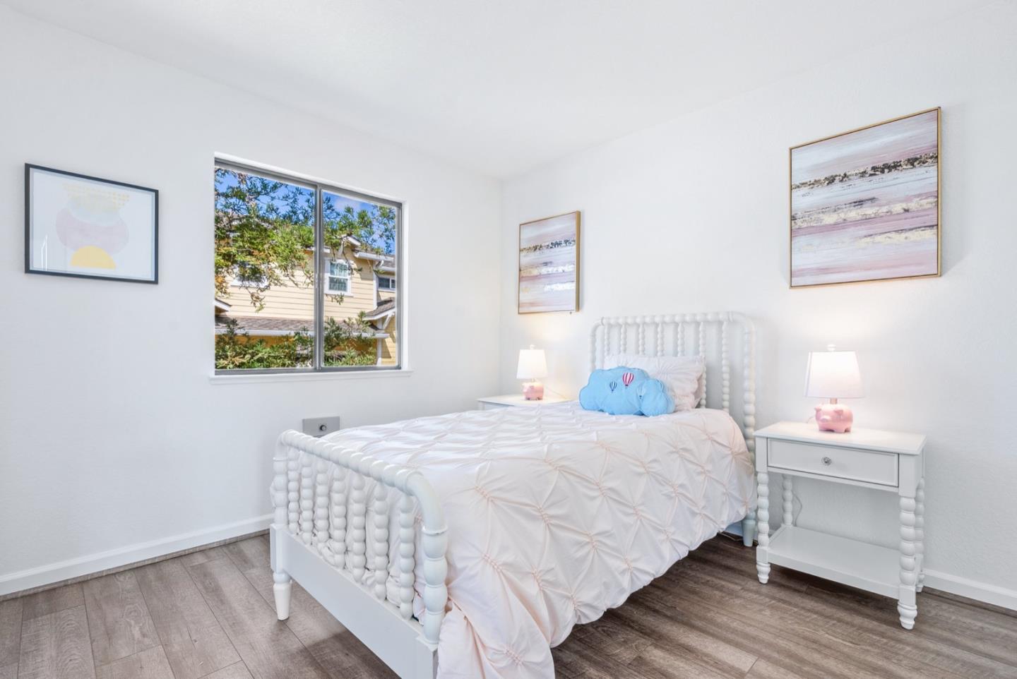 2863 South Bascom Avenue, Unit 804 Campbell, CA 95008 - Photo 20 of 28 a bedroom with a bed and a window