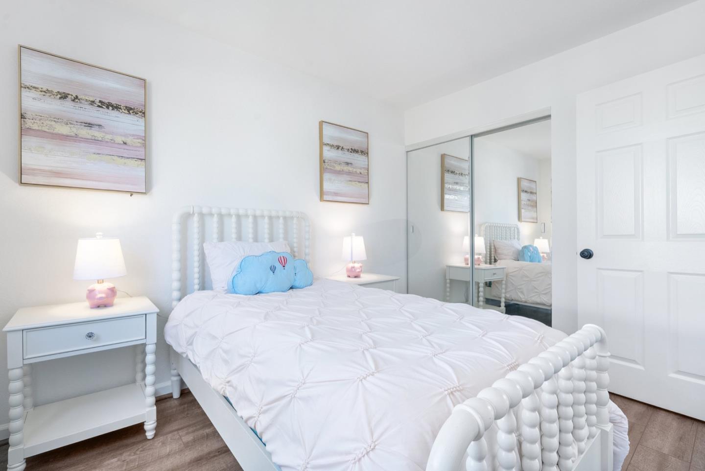 2863 South Bascom Avenue, Unit 804 Campbell, CA 95008 - Photo 21 of 28 a bedroom with a bed and a lamp on dresser