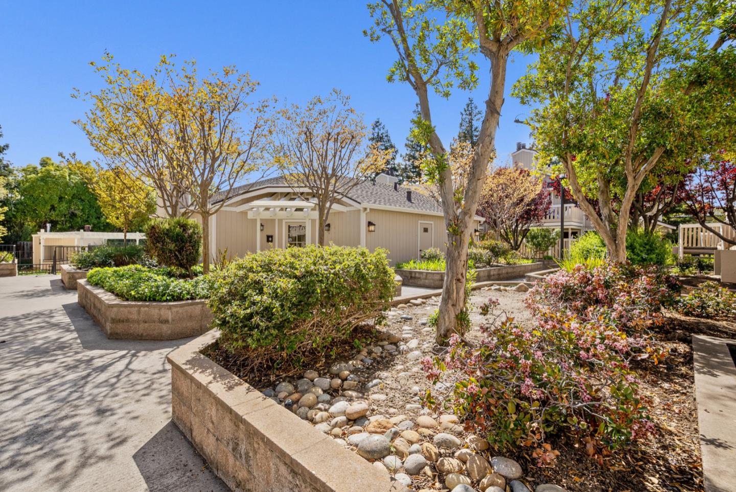 2863 South Bascom Avenue, Unit 804 Campbell, CA 95008 - Photo 23 of 28 a front view of a house with garden