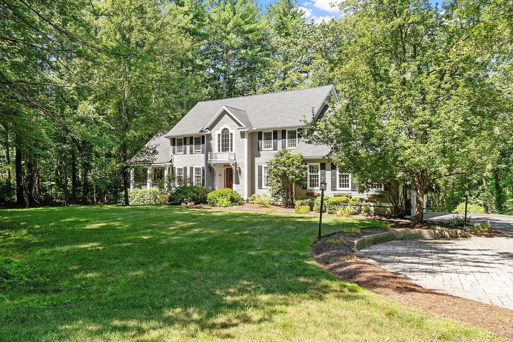 142 Pope Road Acton, MA 01720 - Photo 1 of 42 a view of a house with a yard and sitting area