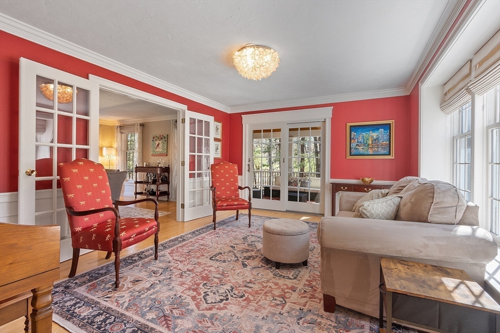 142 Pope Road Acton, MA 01720 - Photo 19 of 42 a living room with furniture and a window