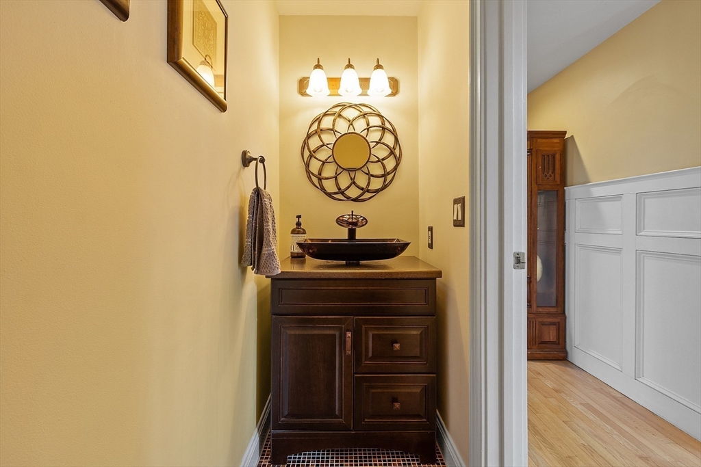 142 Pope Road Acton, MA 01720 - Photo 24 of 42 a close up of a mirror with a sink