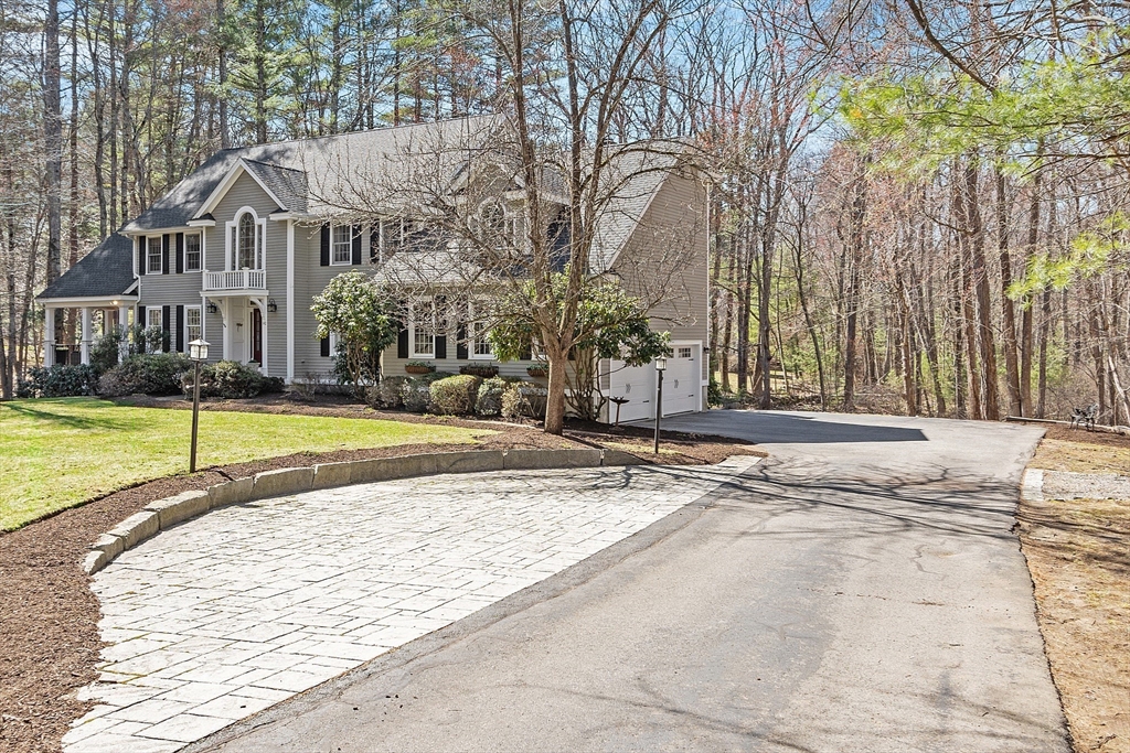 142 Pope Road Acton, MA 01720 - Photo 42 of 42 a view of a house with a swimming pool and a yard