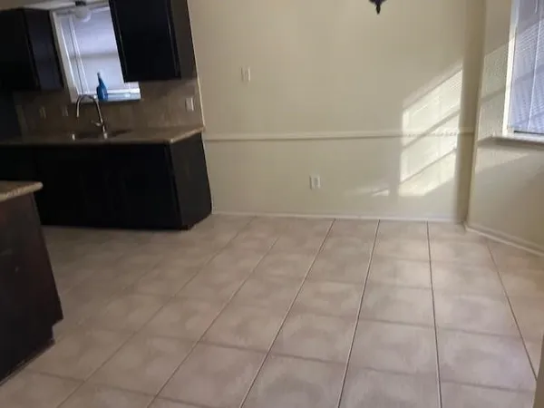 a bathroom with a sink a vanity and a mirror