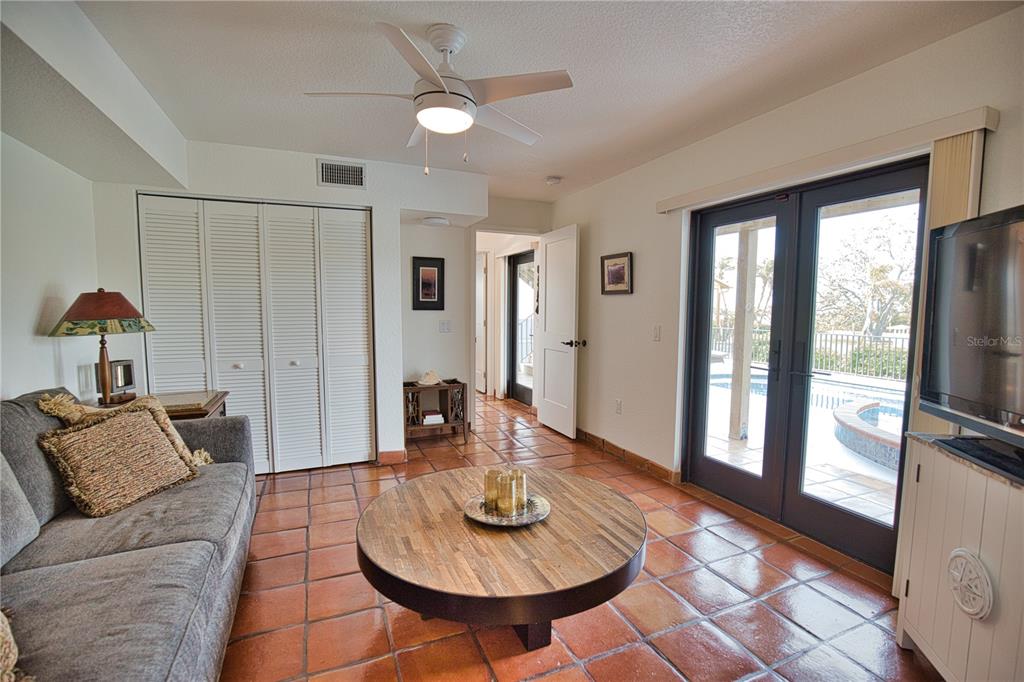 1819 Chadwick Road Englewood, FL 34223 - Photo 65 of 90 a living room with furniture and a table