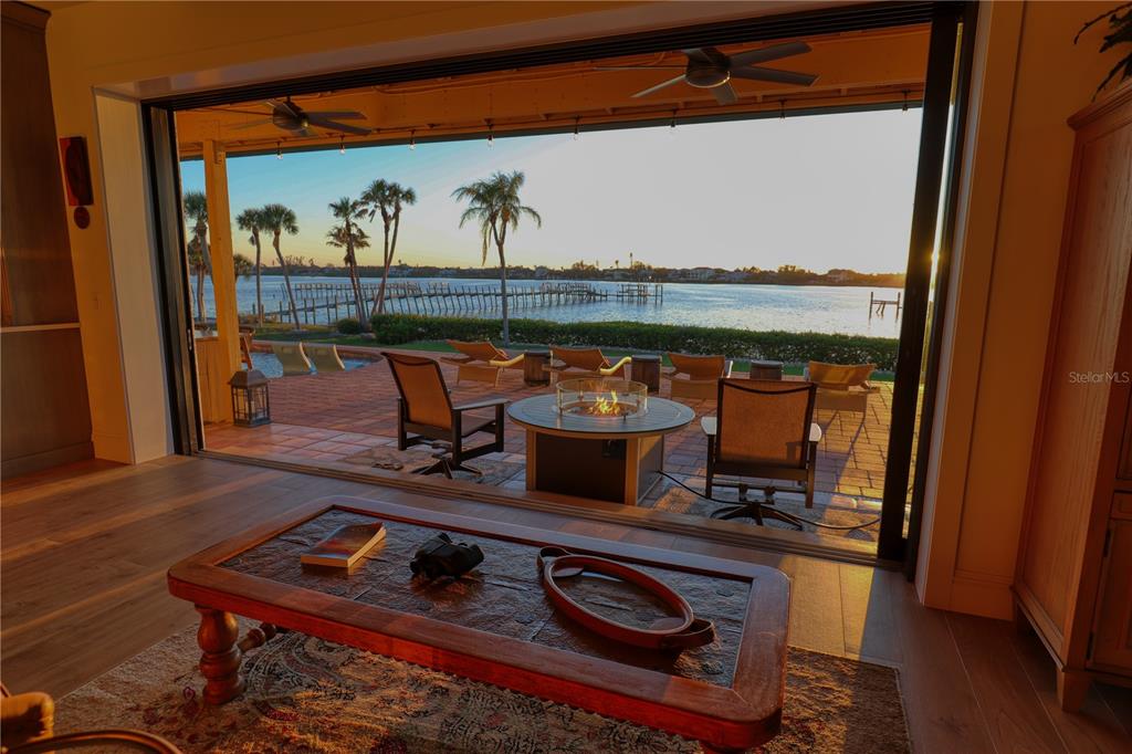 1819 Chadwick Road Englewood, FL 34223 - Photo 86 of 90 a room with furniture and wooden floor