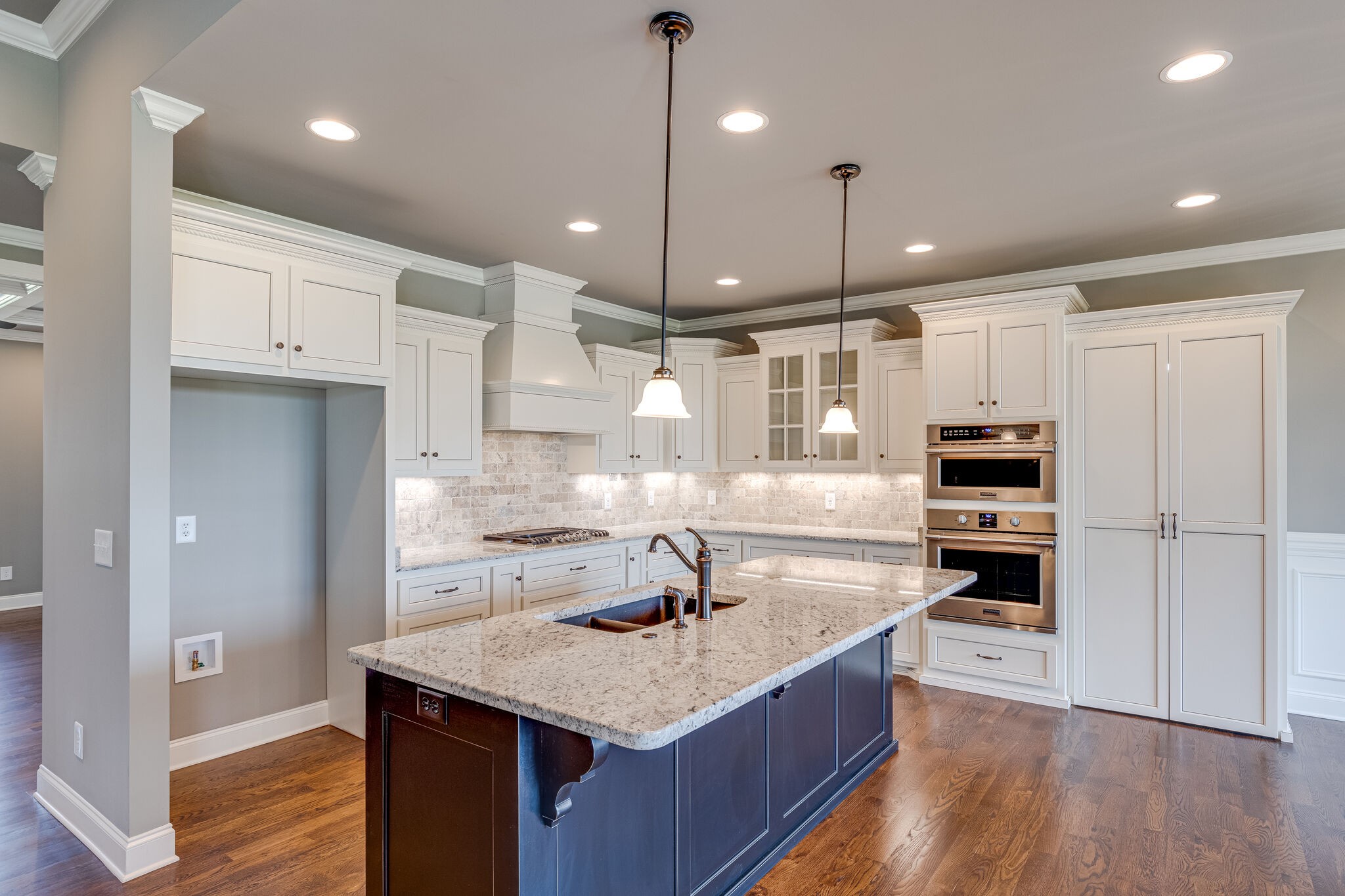 1029 Abbey Rd Way Spring Hill, TN 37174 - Photo 14 of 51 a kitchen with kitchen island a sink stainless steel appliances and cabinets