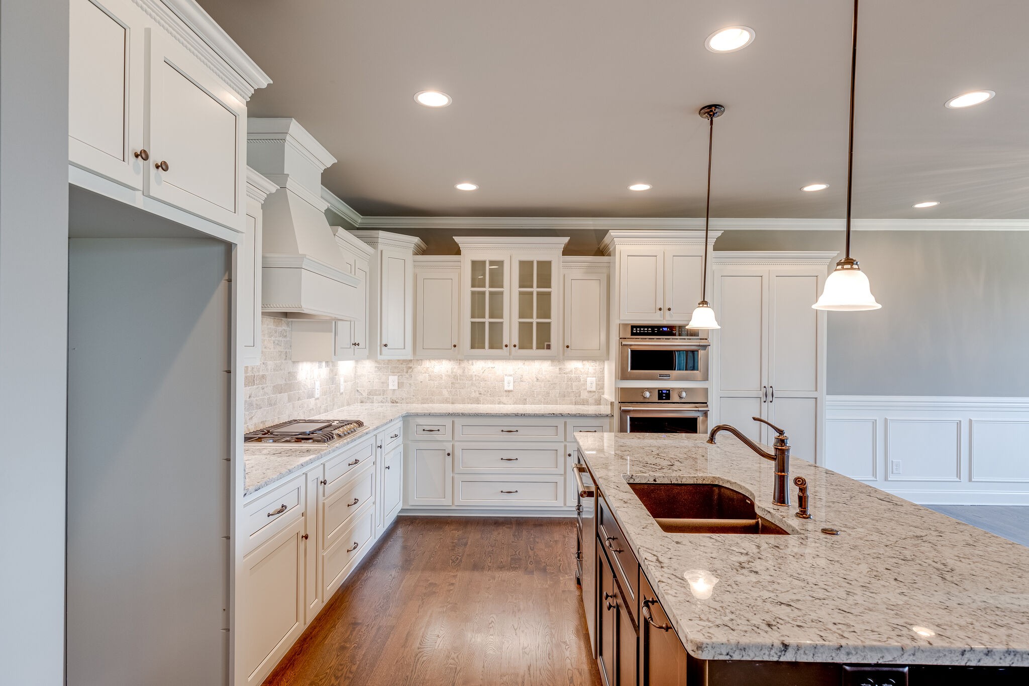 1029 Abbey Rd Way Spring Hill, TN 37174 - Photo 15 of 51 a kitchen with stainless steel appliances granite countertop a stove and a sink