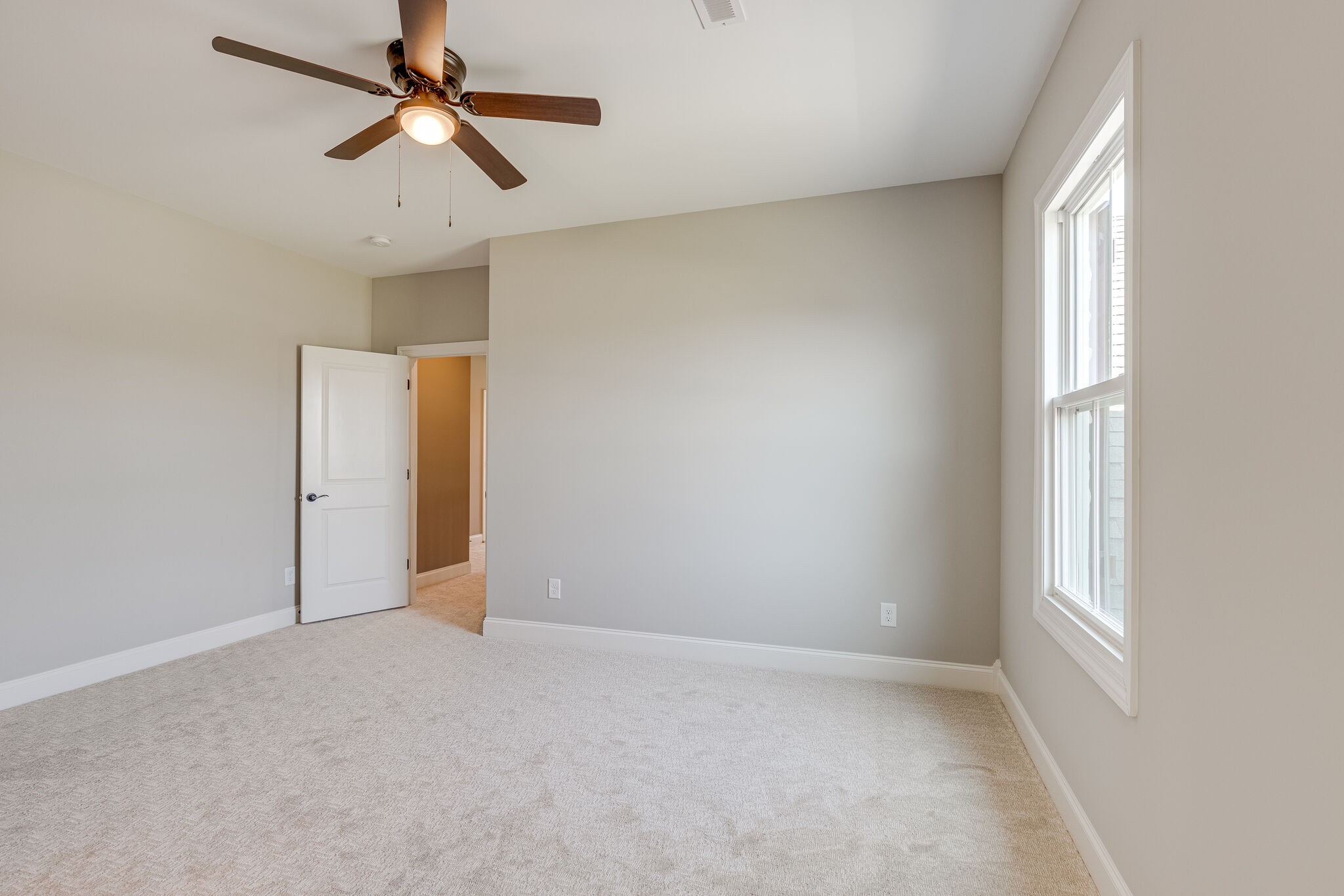 1029 Abbey Rd Way Spring Hill, TN 37174 - Photo 37 of 51 an empty room with a window and a fan