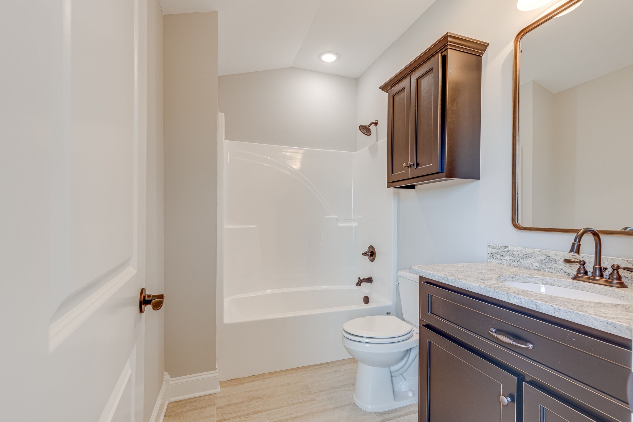 1029 Abbey Rd Way Spring Hill, TN 37174 - Photo 41 of 51 a bathroom with a bathtub shower sink vanity and toilet