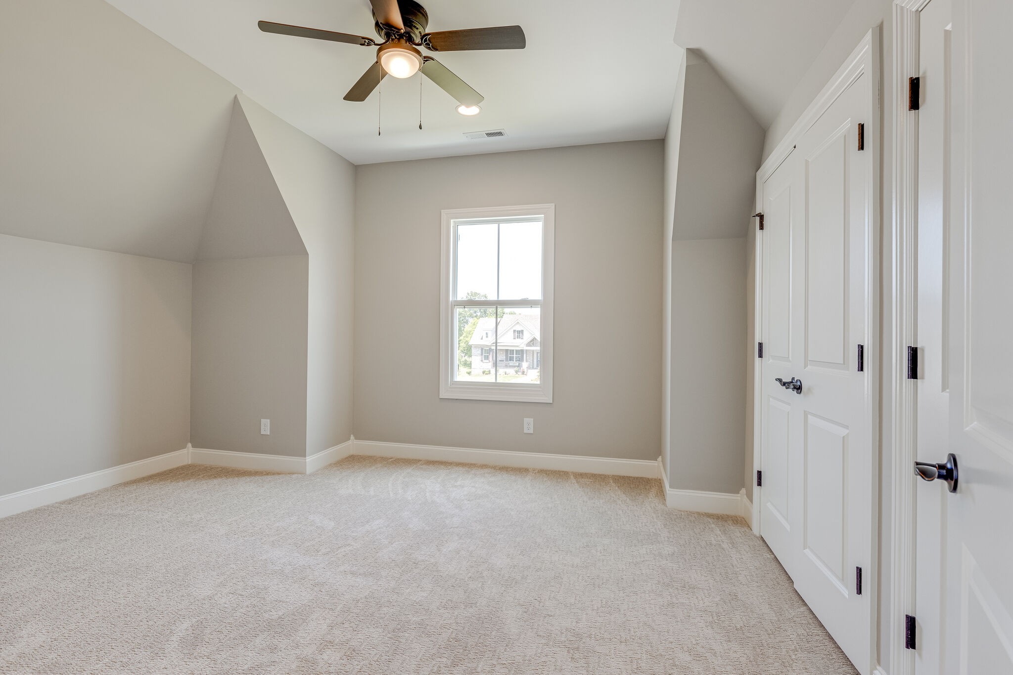 1029 Abbey Rd Way Spring Hill, TN 37174 - Photo 45 of 51 a view of room with a ceiling fan