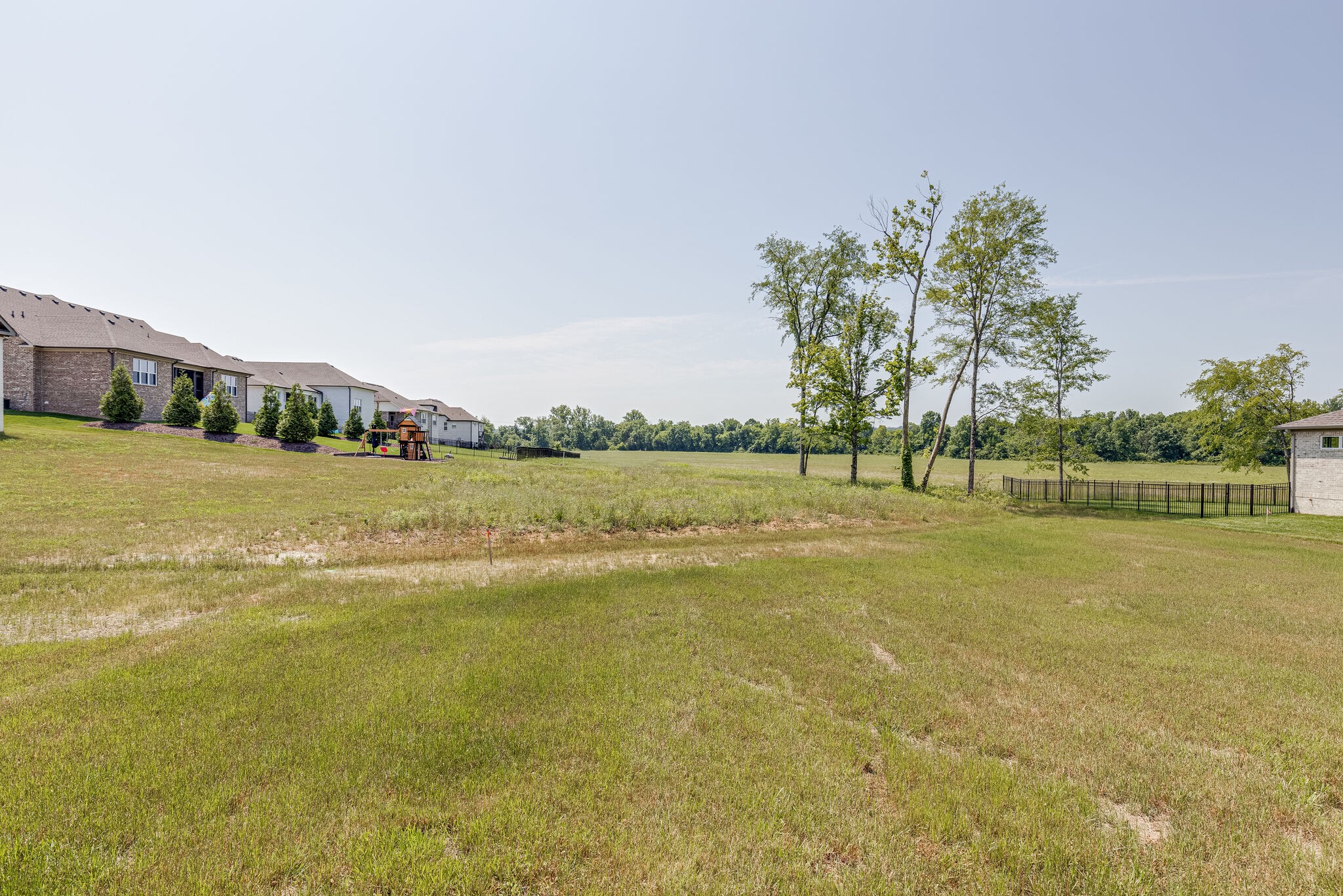 1029 Abbey Rd Way Spring Hill, TN 37174 - Photo 50 of 51 a view of a lake with houses in the background