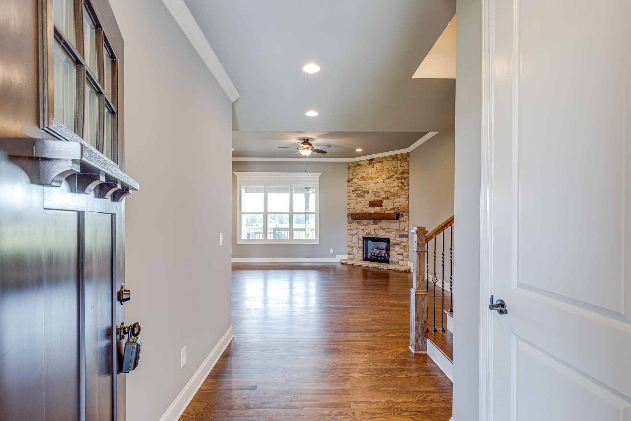1029 Abbey Rd Way Spring Hill, TN 37174 - Photo 7 of 51 a view of entryway with livingroom and wooden floor