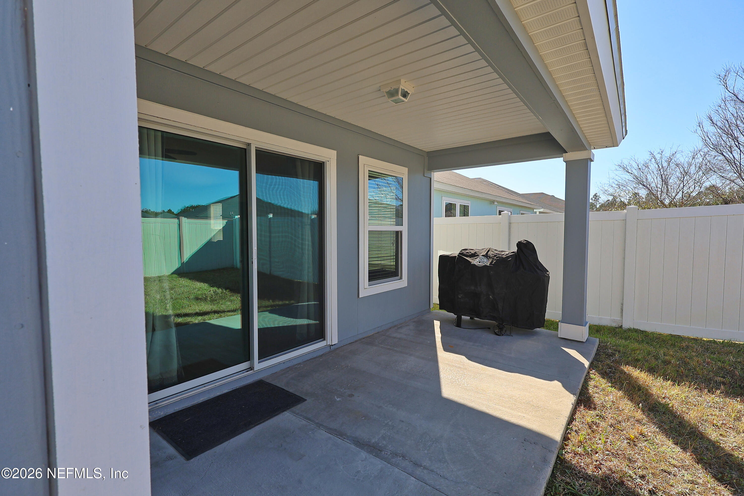 97569 Albatross Drive Yulee, FL 32097 - Photo 36 of 41 rear patio