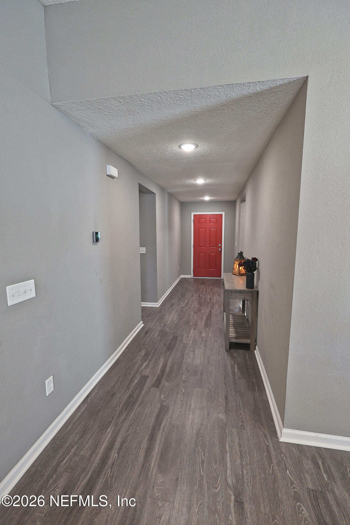 97569 Albatross Drive Yulee, FL 32097 - Photo 7 of 41 a view of a room with wooden floor