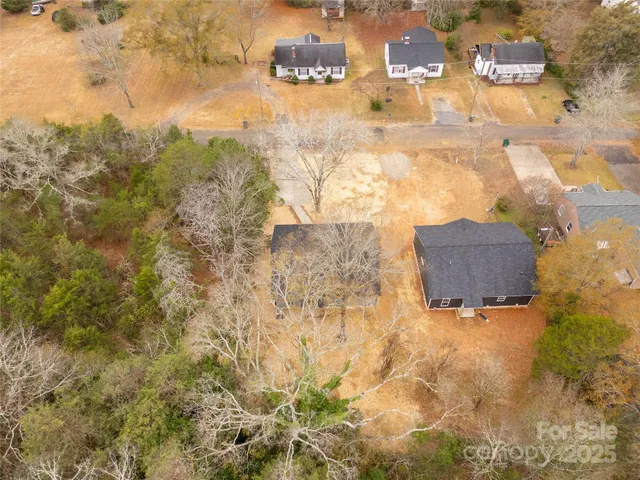 a sign board on the wall of a building