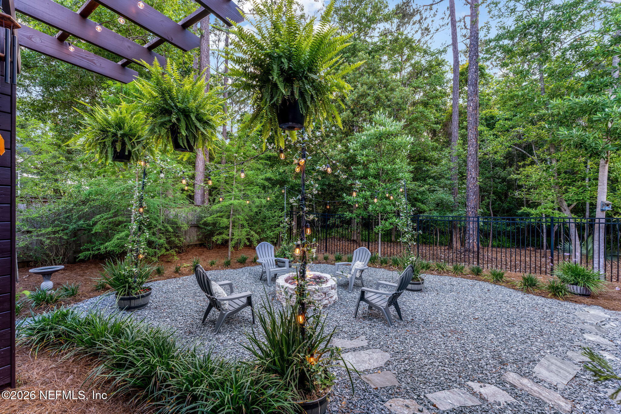 1204 Creek Bend Road St. Johns, FL 32259 - Photo 96 of 107 a backyard of a house with lots of green space and fountain
