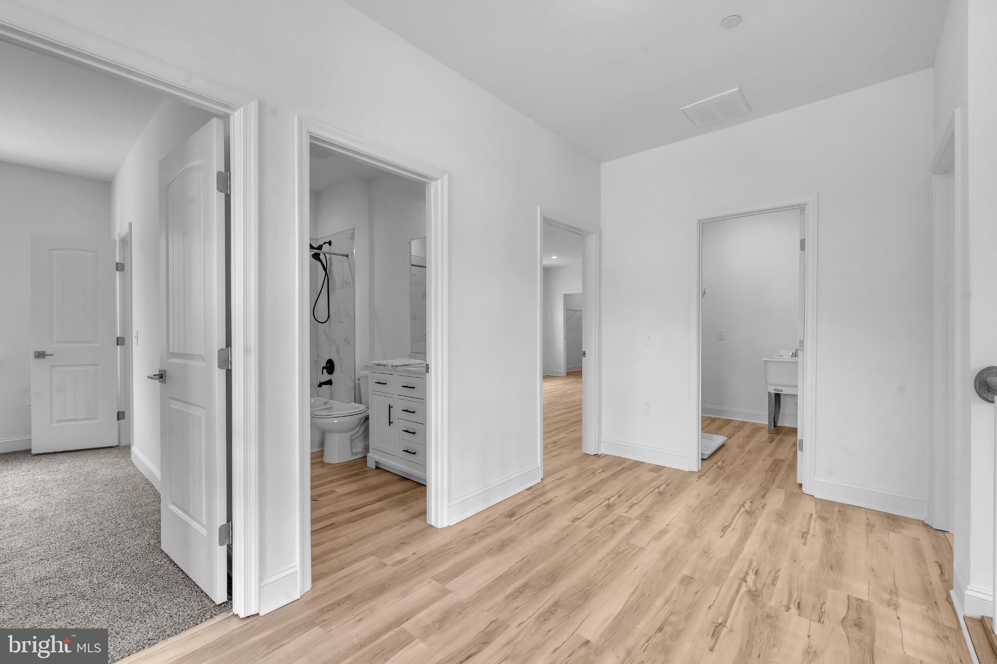 413 Trimble Road Joppa, MD 21085 - Photo 30 of 54 Spacious hallway with modern design elements.