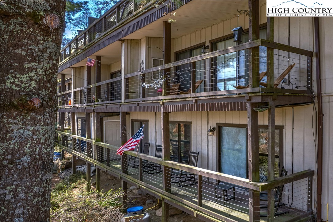103 Mid Holiday Lane, Unit 115D Beech Mountain, NC 28604 - Photo 22 of 25 a view of small house with large windows