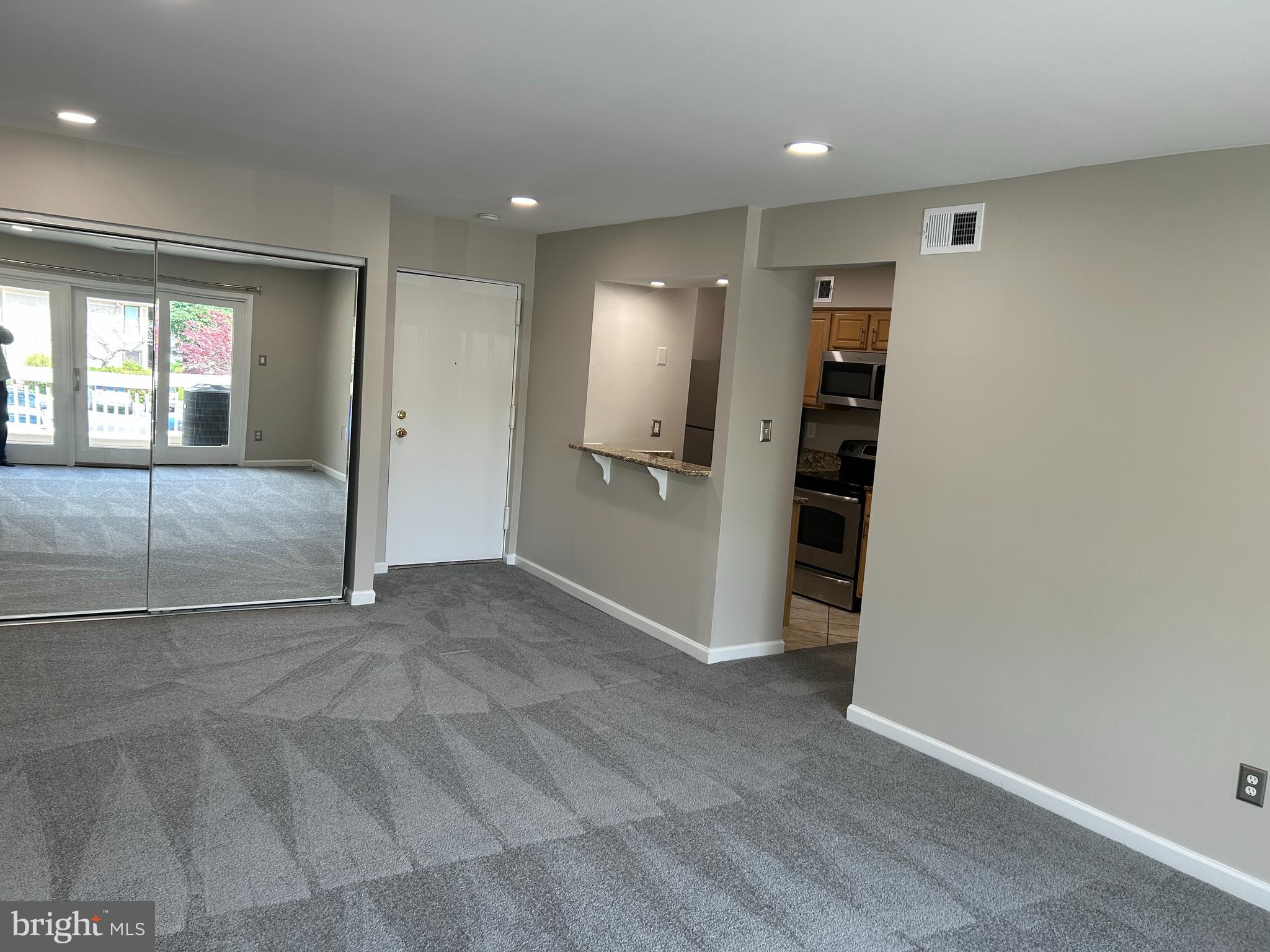5761 H Rexford Court Springfield, VA 22152 - Photo 4 of 18 a view of an empty room