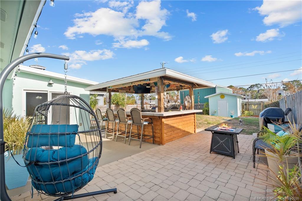 2602 Southeast Jackson Street Stuart, FL 34997 - Photo 31 of 53 a outdoor space with lots of tables and chairs